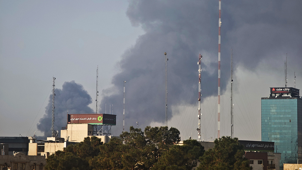 Smoke rises over buildings following explosions in the central region of Tehran, Iran, March 6, 2026. /VCG